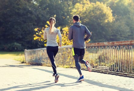 couple-running-or-jogging-outdoors-PF4W4XY