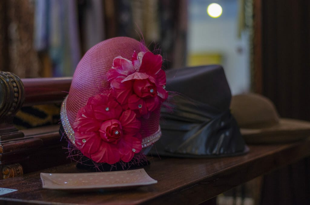 hot pink hat at the cinderella complex boutique in fair oaks village