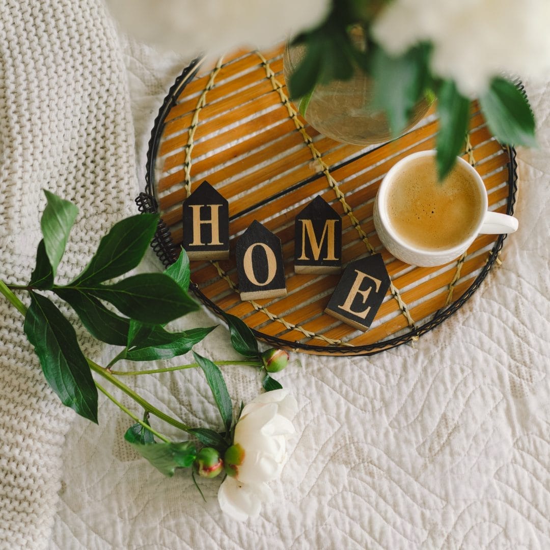 photo of tray and coffee mug with the letters home.